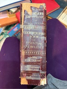 Educational Book of Essential Knowledge - was a Purple Hardcover - faded now